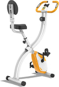 White and orange exercise bike on a white background